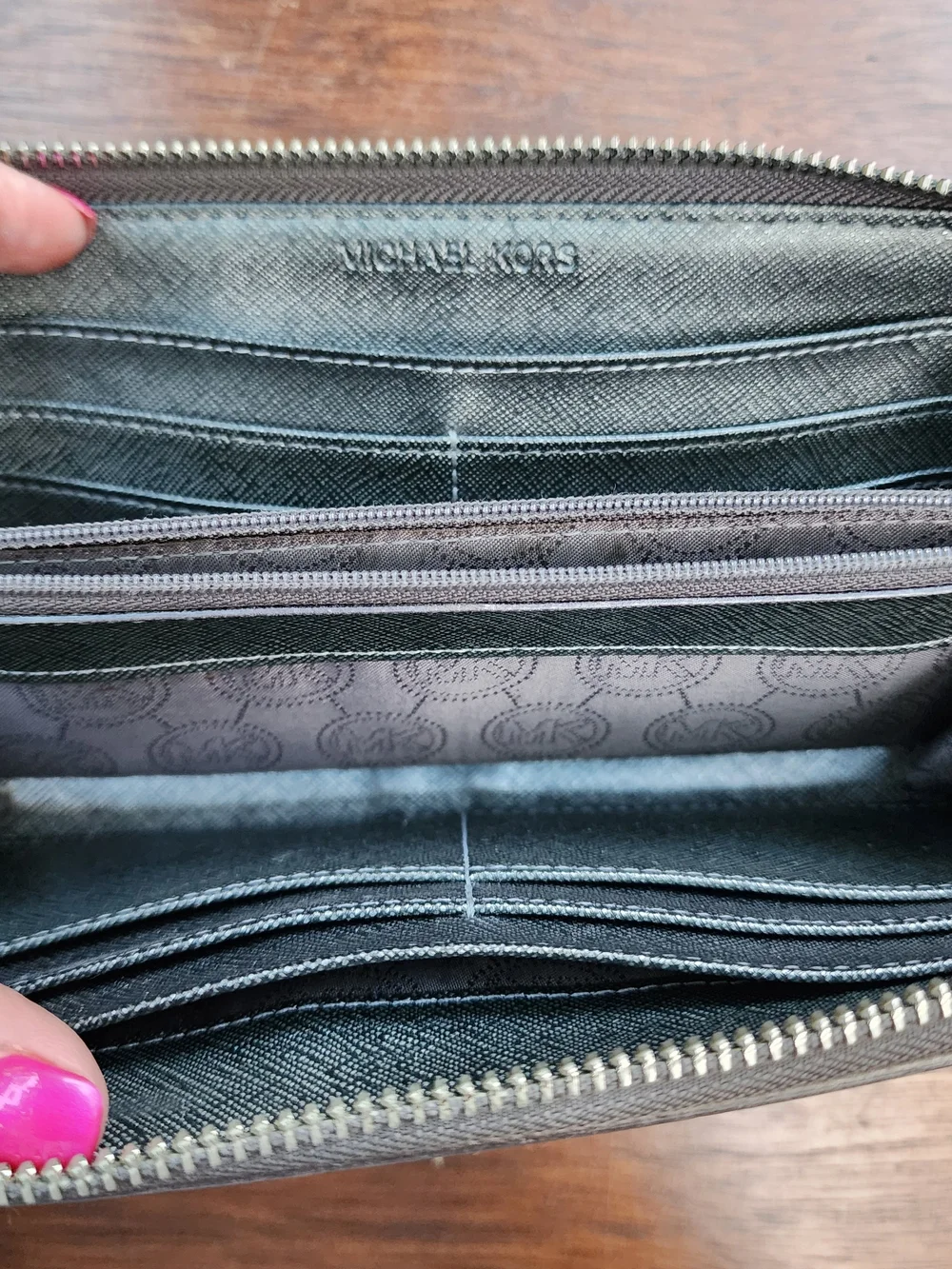 Michael Kors Metallic Pewter Monogram Embossed Zip Around Wallet